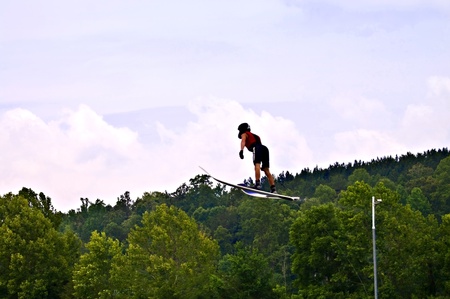 TALKING ROCK, GA/USA - JUNE 19: Unidentified man ski jumping during a  competition, June 19, 2011 in Talking Rock, GA at the  Whitestone Summer Starter Tournament.のeditorial素材