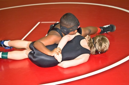  SUWANEE, GA/ USA - DECEMBER 13:  Two young wrestlers at the Archer Beginner and Novice wrestling Tournament. December 13, 2009, in Suwanee, GA.のeditorial素材