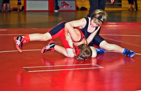 SUWANEE, GA/ USA - DECEMBER 13:  Two young wrestlers at the Archer Beginner and Novice wrestling Tournament. December 13, 2009, in Suwanee, GA.のeditorial素材