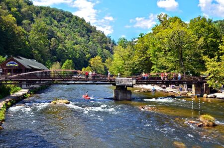  BRYSON CITY, NC, USA - SEPT 9: River's End Restaurant and bridge over the Nantahala River, Sept, 9, 2012. A popular tourist area for hiking and water sports in the Smoky Mountains.のeditorial素材