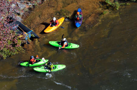 TALLULAH FALLS, GA, USA - NOVEMBER, 2- Men in kayaks ready to go into the rapids on the Tallulah River, November 2, 2014.のeditorial素材
