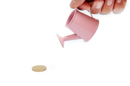 The concept, watering the money to grow.の写真素材