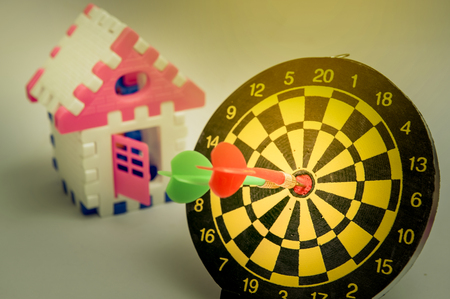 The dart board matches the target. The goal is to have a home.の写真素材