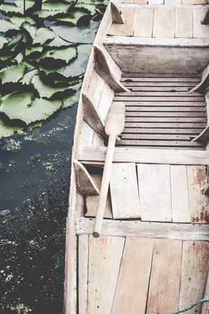 Old paddle boat, parked in the canal.の写真素材