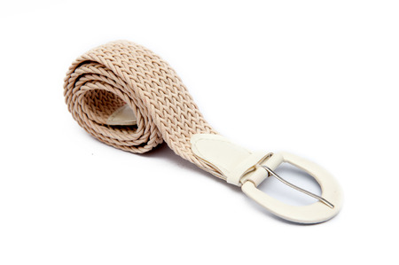 White women's fashion belt, modern fashion on white.の写真素材