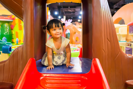 Bangkok, Thailand, June 13, 2017: A cute little girl Playing in Seacon Square theme park. The famous department store in Thailand.のeditorial素材