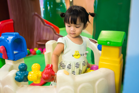 Bangkok, Thailand, June 13, 2017: A cute little girl Playing in Seacon Square theme park. The famous department store in Thailand.のeditorial素材