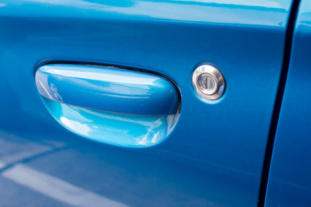 Open the car door blue.の写真素材