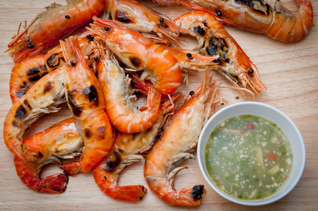 Grilled shrimp, seafood and sauce.の写真素材