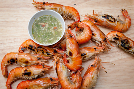 Grilled shrimp, seafood and sauce.の写真素材