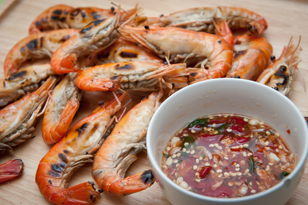 Grilled shrimp, seafood and sauce.の写真素材