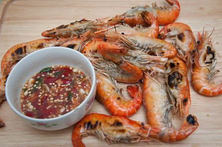 Grilled shrimp, seafood and sauce.の写真素材