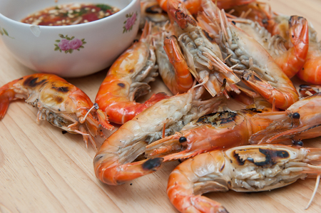 Grilled shrimp, seafood and sauce.の写真素材
