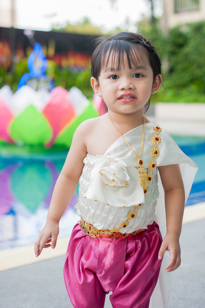 Little girl in Thai traditional costume, Loy Krathongの写真素材