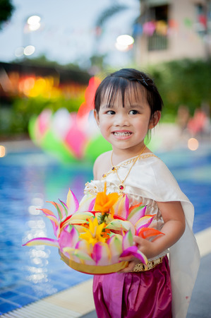 Little girl in Thai traditional costume, Loy Krathongの写真素材