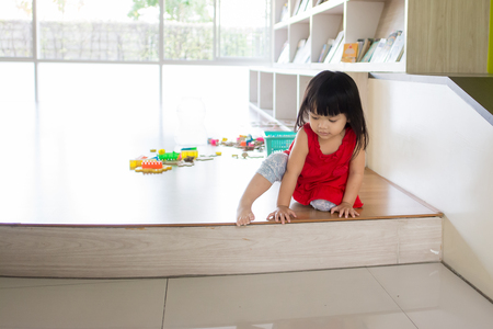 Asian little girl, playing toysの写真素材