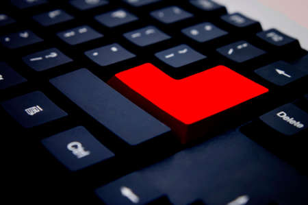 Computer keyboard with red highlight blank keyの写真素材