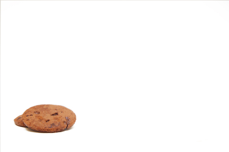 chocolate chips cookies over white backgroundの写真素材