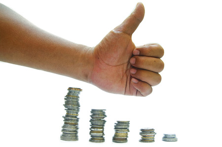 hand and coins over white backgroundの写真素材
