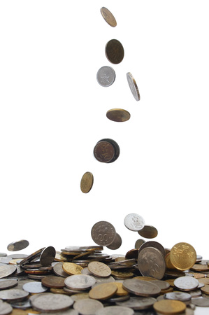 coins drops over white backgroundの写真素材