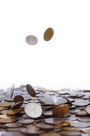 coins drops over white backgroundの写真素材
