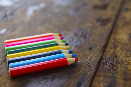 Colourful Colour Pencil Over Wooden Tableの写真素材