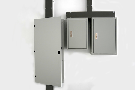 Electrical switchboard on the wall Keep the cord neat Protect from electric shock white wallの写真素材