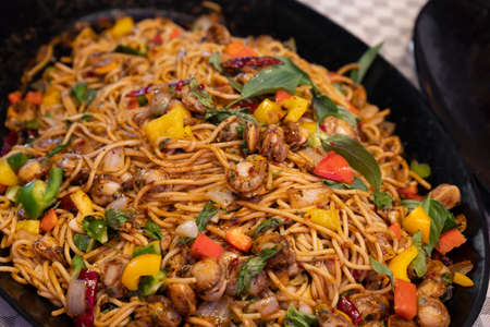 Spaghetti scallop with spicy, sweet pepper and basil.Thai-style fusion food.の写真素材