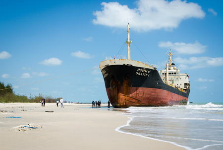 Songkhla, Thailand - March 01:Traveller sightseeing the Ships ORAPIN 4 is a liquefied natural gas...
