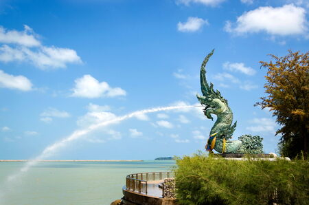 Naga statues  was sprayed Water in Songkhla, Thailand.の写真素材