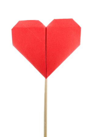 red heart shaped candy lollipop make from paper isolated on white backgroundの写真素材
