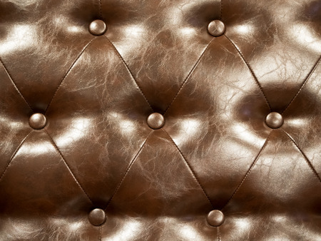 Genuine leather upholstery background for a luxury decoration in Brown tonesの写真素材
