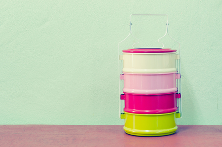 metal Tiffin,thai food carrier on mint background in pastel colorの写真素材