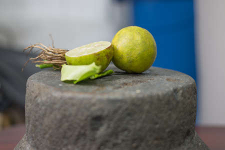 mortar and lemon ingredient prepare for thaifood