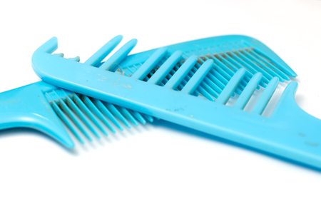 Pair of good and decay comb on white background