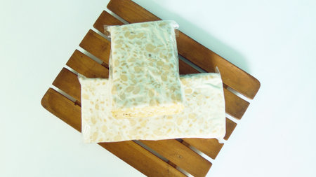 White soybean tempeh. Tempeh is a food that is widely found in Asia. This processed food from...