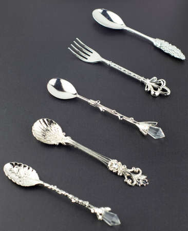 Cutlery set with Fork Knife and Spoon isolated on blackの写真素材
