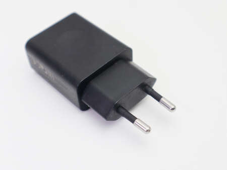 photravel charger in white background selective focusne travel charger