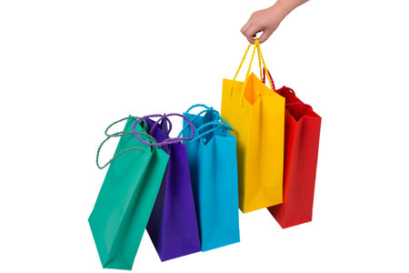 shopping cart and Background with colorful shopping bagsの写真素材