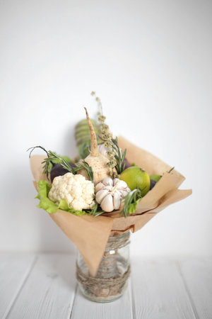 bouquet colors hand fruits vegatables backgroundの写真素材