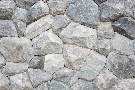 Stone wall can be used a backgroundの写真素材