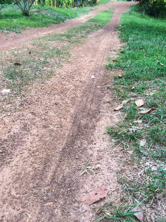 Wheel track on gravel roadの写真素材