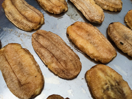 dried banana on stainless trayの写真素材