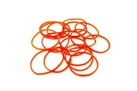 Red plastic band isolated on white backgroundの写真素材
