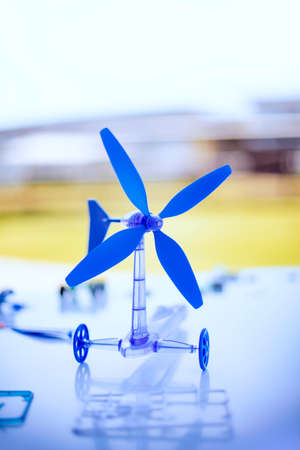 close-up photo of Photos. Model windmill toy. on the playground