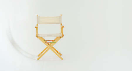 The director's chair in the white studioの写真素材