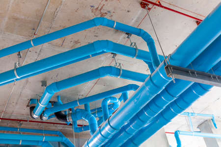 Large blue pipe PVC for the construction of high-rise residential buildings.の写真素材