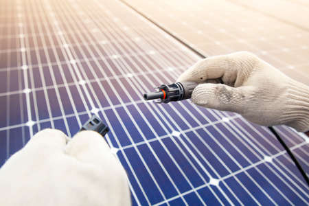 Installing solar panels, Renewable energy clean and good environment.