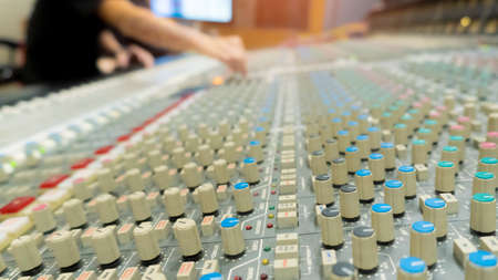 Sound engineering in the studio. Professional audio, sound mixer controller panel.Pro equipment for music and concerts.の写真素材