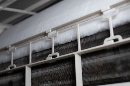 close up ice on coil cooler of dirty air conditioner.の写真素材